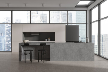 Stylish home kitchen interior with stone bar counter and cabinet, window