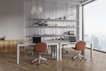 Modern office interior with work zone and chairs in row, panoramic window