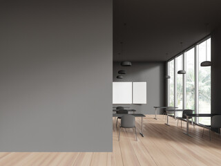 Grey classroom interior with furniture and chalkboard, window and mockup wall