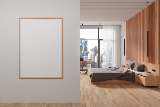 Cozy bedroom interior bed and work space near panoramic window. Mockup frame