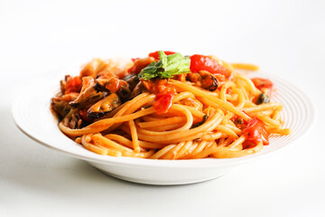 plate of seafood spaghetti with fresh Neapolitan cherry tomatoes