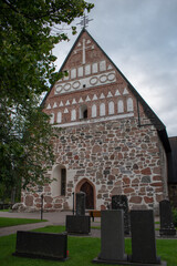 Fototapeta na wymiar Medieval greystone Church of St. Mary in Hollola (Finnish: Hollolan kirkko), Finland.