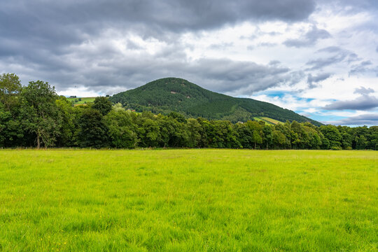 Green mountain landscape near Loch Ness in Scotland, photo with copyspace.