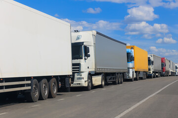 Trucks on road in a traffic jam - 642373306