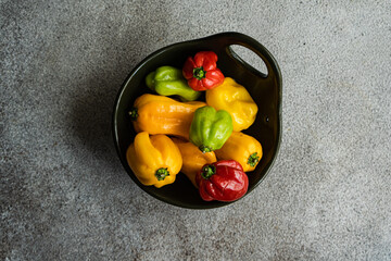 From above of different colored peppers