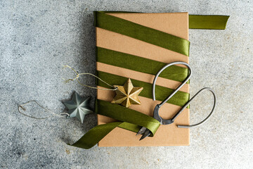 Holiday gift wrapping with scissors