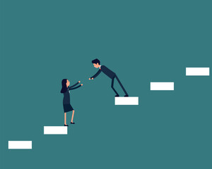 Business team pulling partner up the stairs