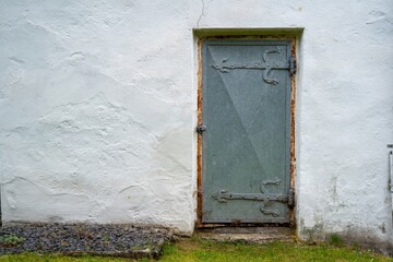 door on the wall of an old castle