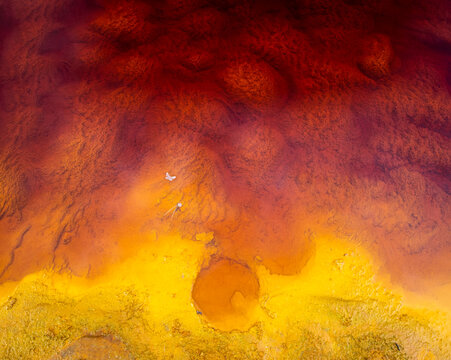 Surface of stone with yellow abstract texture background