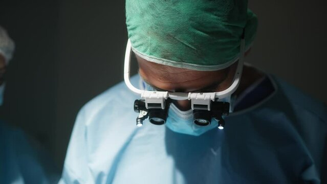 Surgeon Operates On The Eye Retina