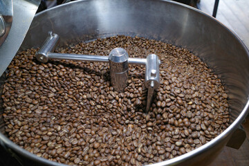 Cusco, Peru - 3 Dec, 2022: Fresh coffee beans roasted in the Sacred Valley