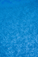 Back background. Snow texture on glass
