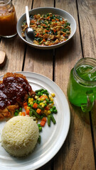 Asian food and beverages on wood table
