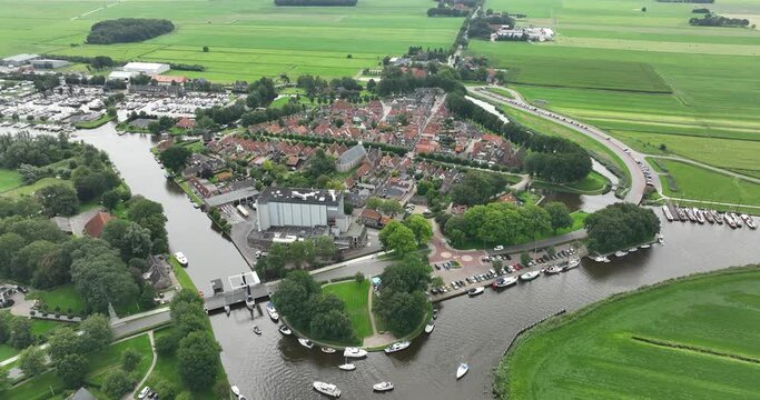 Aerial drone view of the smallest city in Friesland, SLoten. Sloten is connected to the Slotermeer via the Slotergat and is located between Lemmer and Balk.