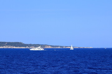 Boat in front of Bonifacio beacon , Corsica, France