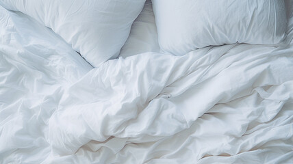 Fototapeta na wymiar white pillows on a bed, top view
