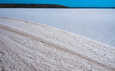 Self-precipitating table salt sodium chloride on the surface of a dried-up reservoir - Kuyalnik...