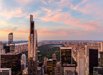 Fototapeta na wymiar New York City skyline with Central Park at sunset from rooftop.