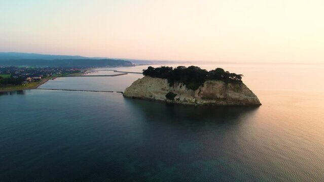 見附島（軍艦島）Drone photography of Mitsukejima (Gunkanjima), a famous landmark in Suzu City, Ishikawa Prefecture.