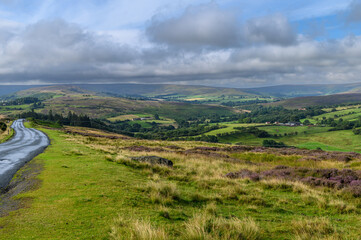 Fototapeta na wymiar View of the North York Moors at Blakey Ridge on a cloudy morning with a view to distant hills