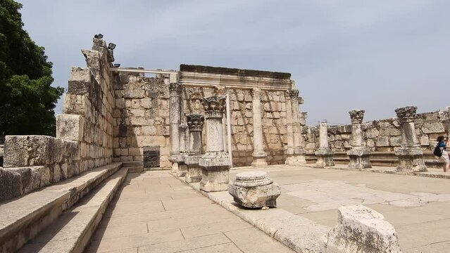 Wide, glide cam into Capernaum Synagogue in Jerusalem