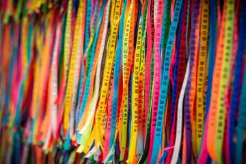 Various Senhor do Bonfim Bracelets as Colorful Souvenirs from Bahia - obrazy, fototapety, plakaty