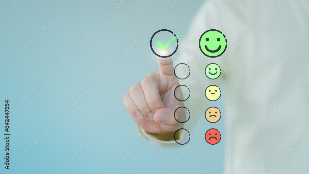 Poster customer hand touching the virtual screen on happy smile face icon to give satisfaction in service. 