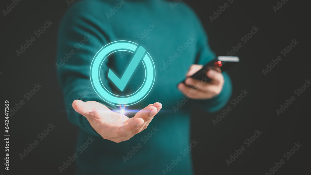 Leinwandbilder User man showing on hand identity proofing icon for security protection system on virtual screen. Quality assurance of business service. Certified guarantee approval or secure access system concept.