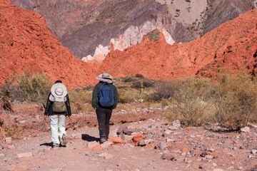 A couple of young tourists walking through the Quebrada de las Señoritas, in Uquía, Jujuy, northwestern Argentina.
