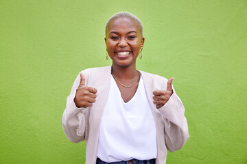 Happy, thumbs up and portrait of black woman by a green wall with classy and elegant jewelry and...