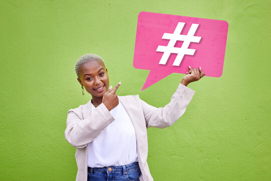 Portrait, pointing and black woman with a hashtag speech bubble for social media. Contact, African person or girl with a board for a blog sign, networking or virtual connection on a green background