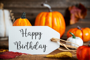 Orange Pumpkin Decoration With Label With Text Happy Birthday