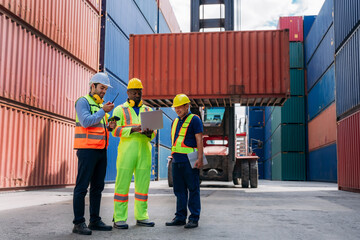 Industrial Engineer checking inventory or task details at Container cargo harbor. Logistics Expert Overseeing Shipping and Distribution Operations.