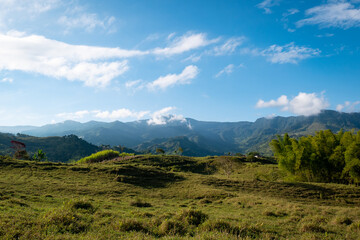 Aerial View of a Beautiful Mountain near Jardin, Antioquia, Colombia Surrounded by Hills, Farmlands and Forests at Dawn