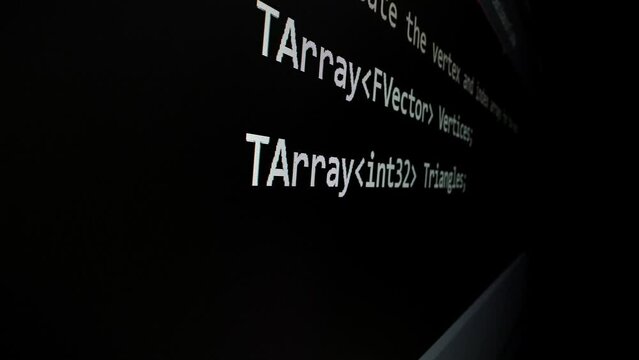 Closeup macro shot movement of coding script moving across LED screen with real-time AI-generated typing, showcasing advanced AI learning in optimization, debug and coding for software development.