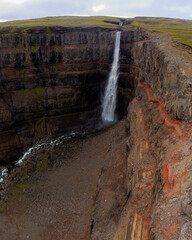 Aerial drone view of heengifoss waterfall in Iceland