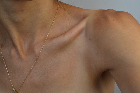 beautiful collarbone and shoulders of the girl