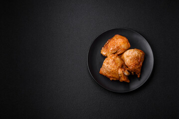 Delicious grilled chicken thighs with salt, spices and herbs