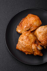 Delicious grilled chicken thighs with salt, spices and herbs