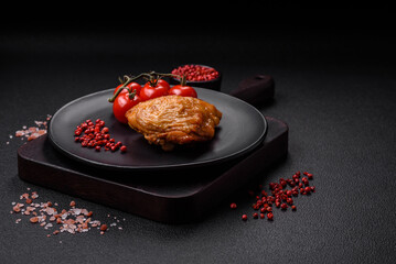 Delicious grilled chicken thighs with salt, spices and herbs