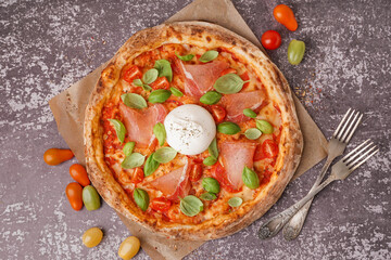 Tasty pizza with Burrata cheese on grey background