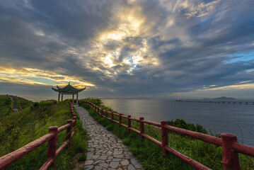 pathway by the sea at Tai O Fu Shan Viewing Point during sunset