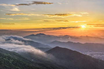 sunrise in the mountains at tai mo shan