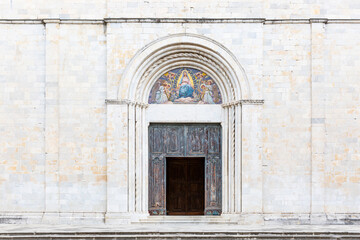 Fototapeta na wymiar portal of the Cathedral of Santa Maria Assunta in Sarzana, Province of La Spezia, Liguria, Italy