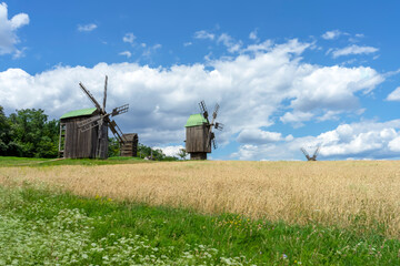 Summer landscape of traditional Ukrainian windmill in the countryside
