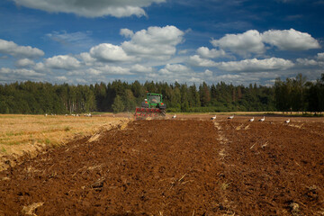 tractor plowing the field