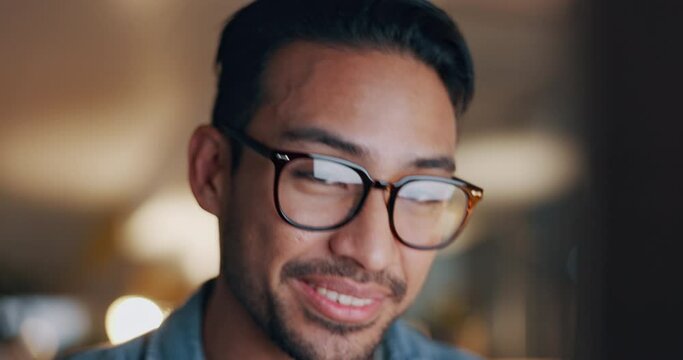 Business man, glasses and reading on computer for programming, software or information technology solution. Happy asian programmer in screen reflection for IT problem solving, results or night coding
