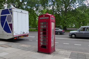 disused red telephone box in london...