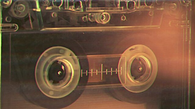 Vintage audio cassette tape recorder playing. Old school magnetic analogue reel player 1980s - 1990s. Retro style album design and music technology history concept. Historical voice record archive