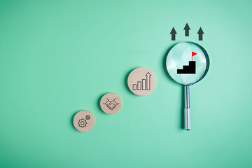 Magnifying glass with business target goal icons, Business growth process, Business strategy...
